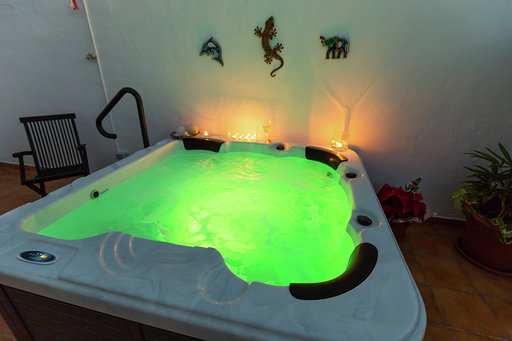 hot tub at night green lights